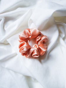 "Coral silk baby scrunchie